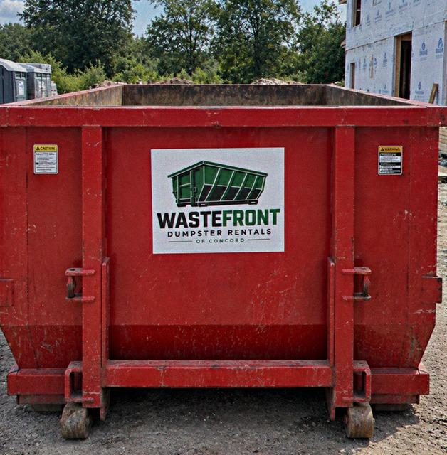 Open container partly loaded with debris at a work site